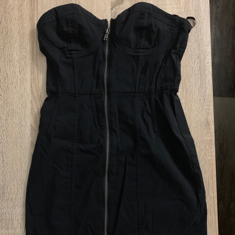 Strapless, sweetheart style tight black dress